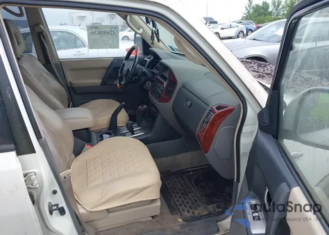 2004 Mitsubishi Montero Xls z USA, uszkodzony, nr VIN JA4MW51S64J005453